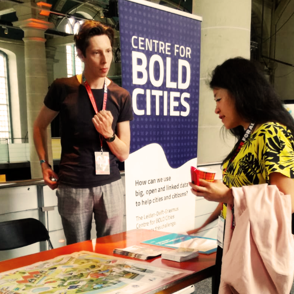 The BOLD Cities team explains its research game at the Cities for Digital Rights conference.