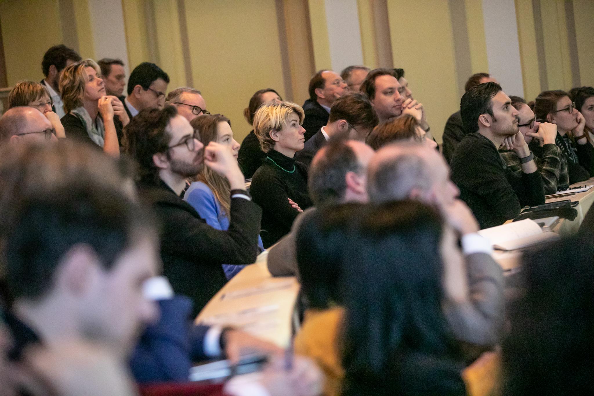 Audience at BOLD Cities kick-off, listening to Peter Swire.